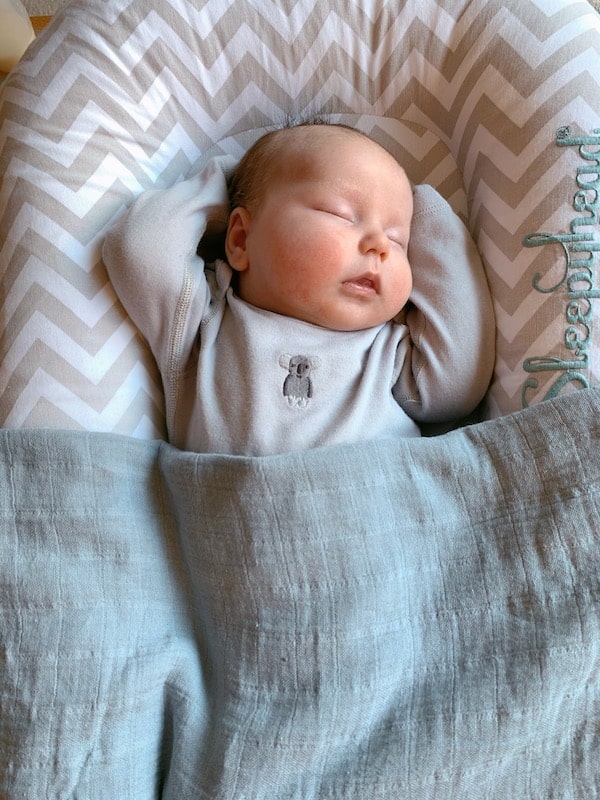 Baby sleeping in Sleepyhead/ Dock-a-tot