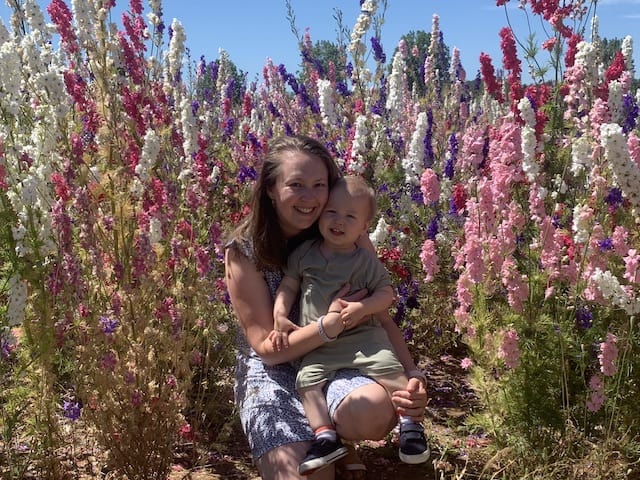 Rory and I sitting in the confetti fields both smiling